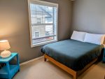 Full size bed in the guest bedroom